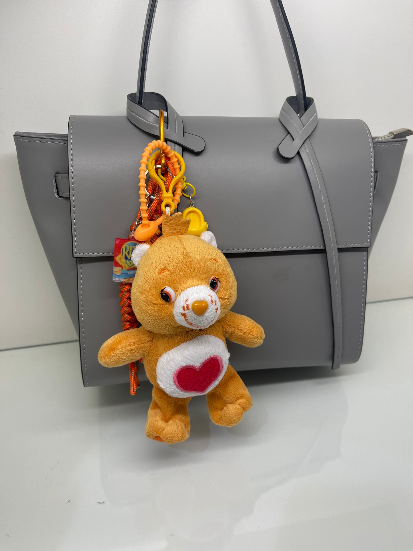 Bijou de sac " Orange Care Bear " - Edition Rainbow Dream