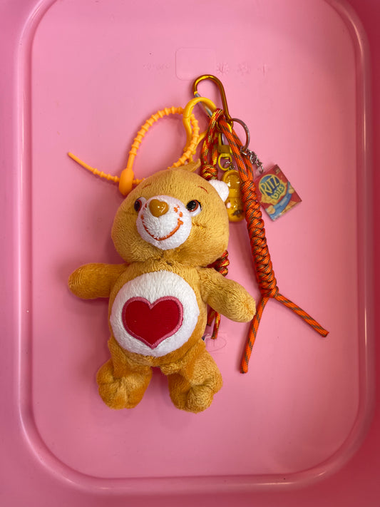 Bijou de sac " Orange Care Bear " - Edition Rainbow Dream